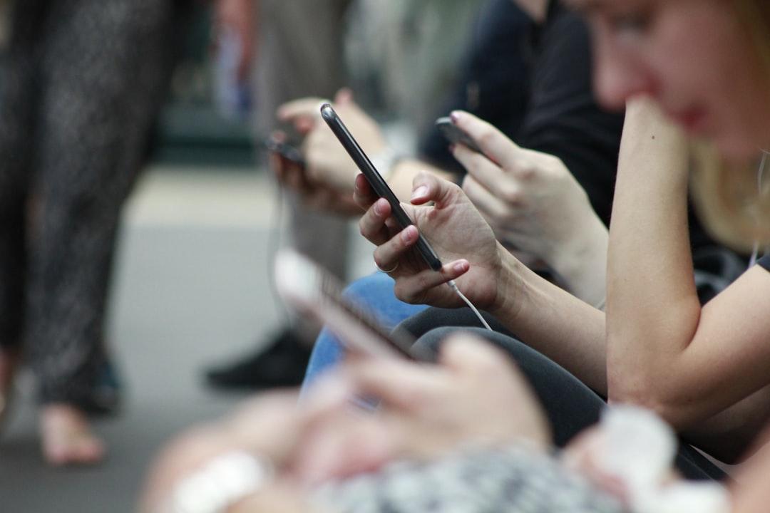 The Effects of Mobile Phones on Individuals and Communities in the Light of Technological Determinism Theory